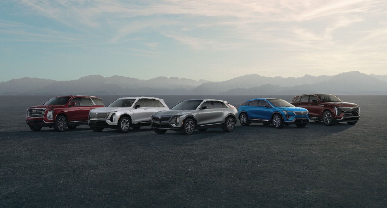 Cadillac Vehcile Models arranged in a line facing outward towards the viewer